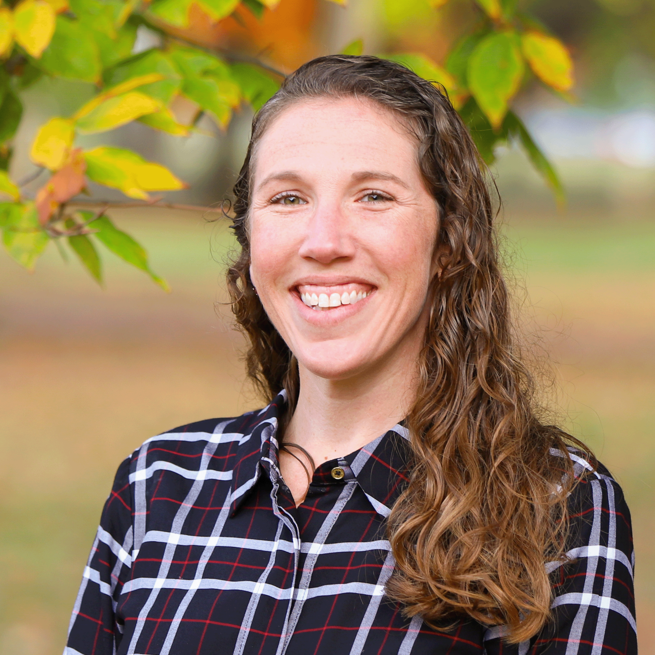 Portrait of Jenny Moss with nature in the background