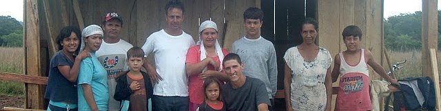 Photo of Peace Corps volunteer with Paraguyan villagers